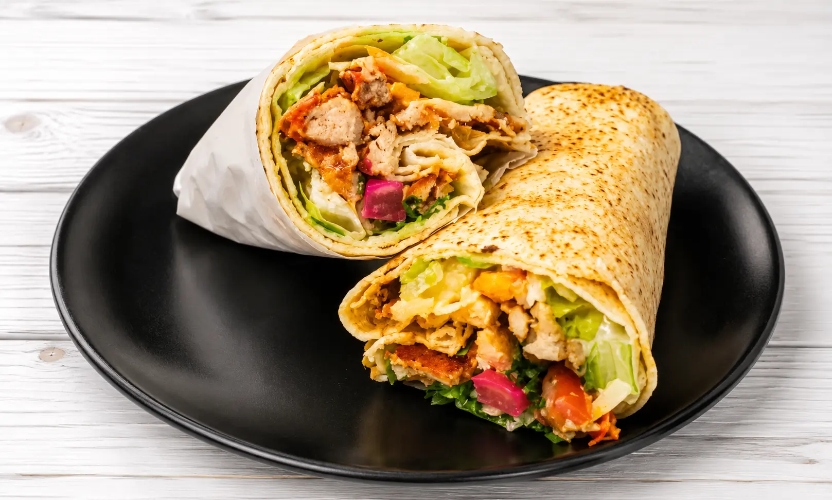 Chicken Wrap served with fries at Calzone Express in Shawnessy, Calgary, AB
